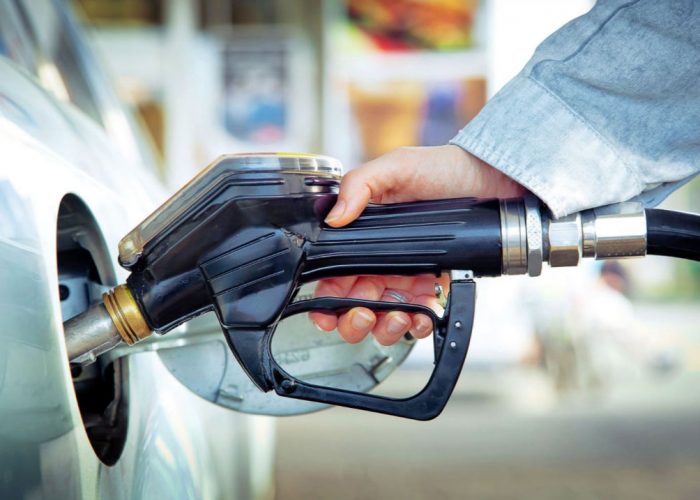 fueling-the-car-at-a-gas-station.-1076x717